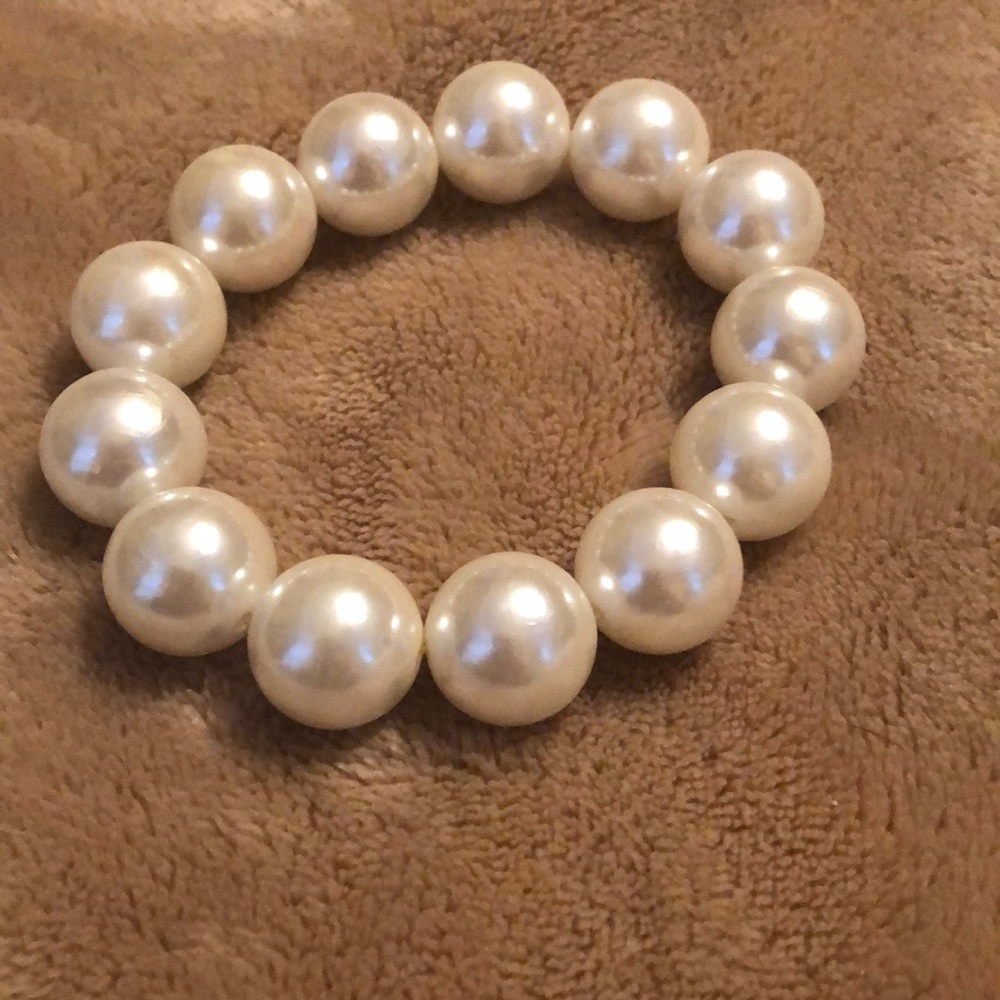 Large White Plastic Pearl Bracelet